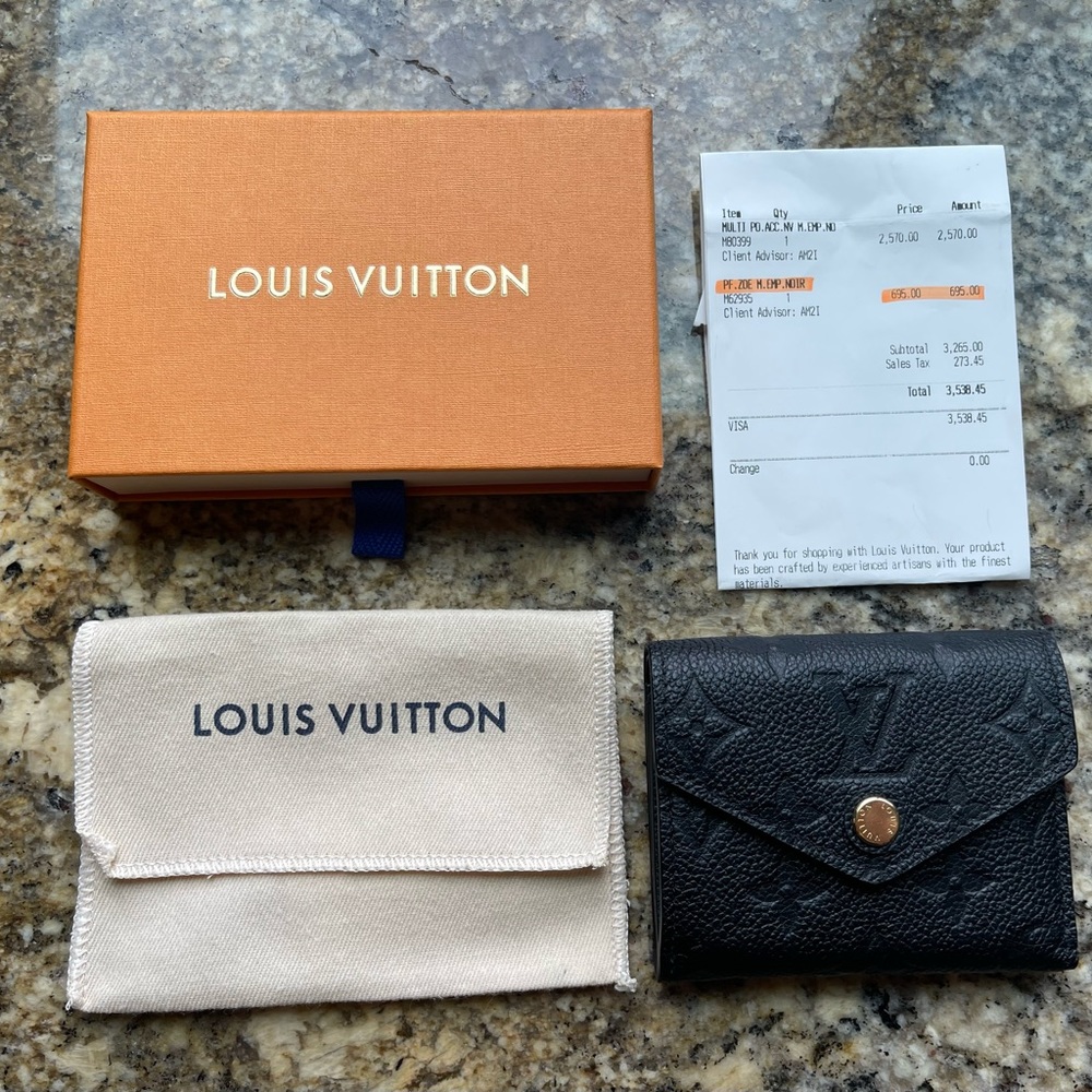 Louis Vuitton Wallet.  ZOE M62935 NEW with Box.